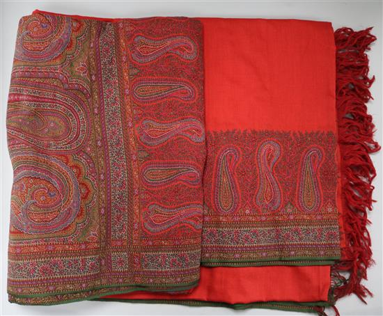 A 19th century red wool paisley shawl with red central medallion